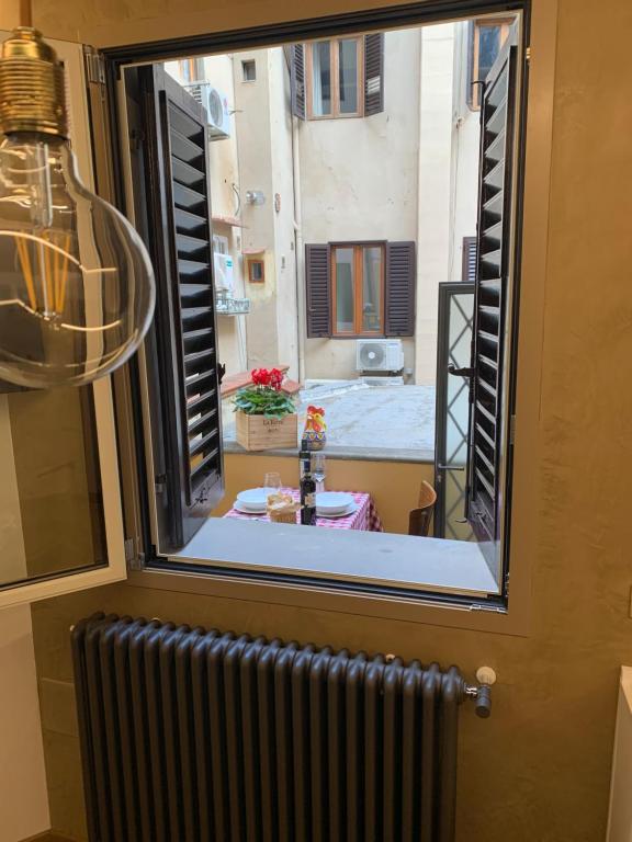 AI MAGAZZINI DEI MEDICI (casa con balcone) room 5