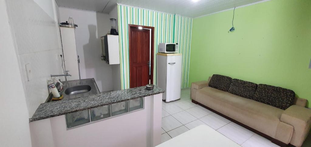 Kitnet Laranjal room 2