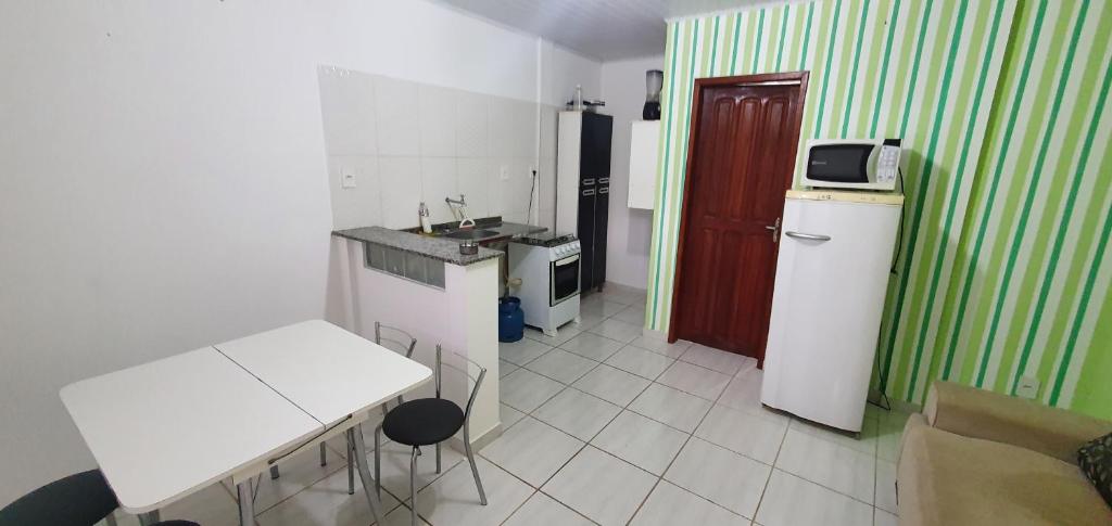 Kitnet Laranjal room 4