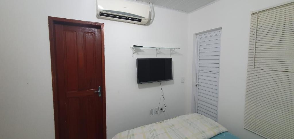 Kitnet Laranjal room 5