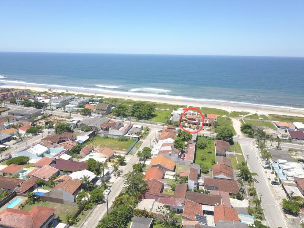 Apartamentos na Quadra do Mar room 1