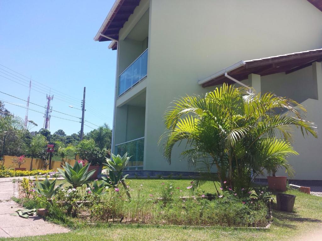 Paraíso do Santinho Apartamentos room 6